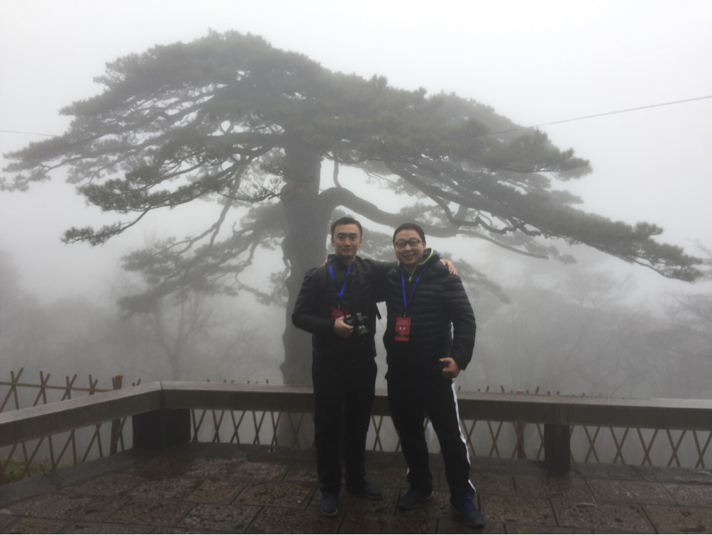 My colleague Mr. Qin and I at Black Tiger Pine Tree Near Beihai Hotel